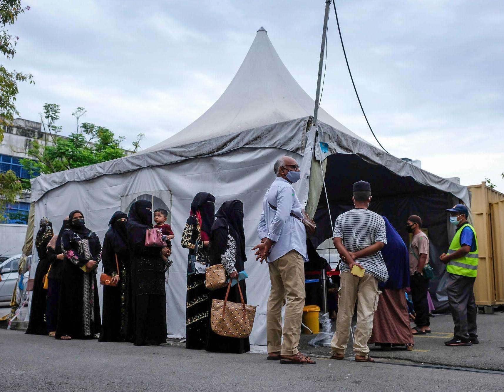 Triage at the MSF clinic in Butterworth, Penang.