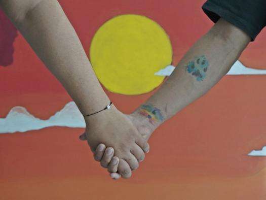 A couple at MSF's San Pedro Sula clinic in Honduras, which aims to improve access to health care for the LGBTQI+ community and sex workers.