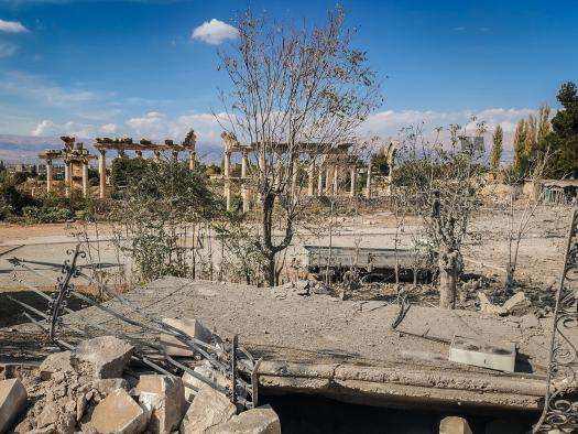 Destruction in front of Roman ruins in Baalbek, Lebanon