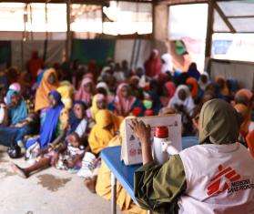 An MSF staffer leads an education session in Katsina, Nigeria. 