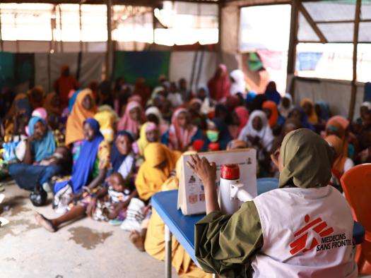 An MSF staffer leads an education session in Katsina, Nigeria. 