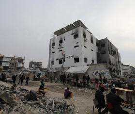 Tents next to the damaged exterior of Kamal Adwan Hospital in Gaza. 