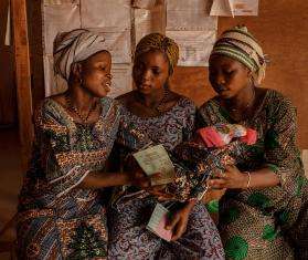 A new mother holds her baby in Benin. 