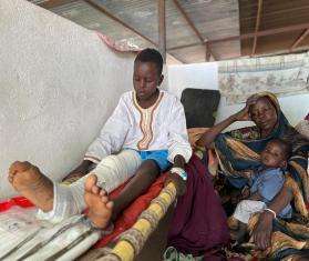 A boy wounded while fleeing Zamzam camp, North Darfur, in April. 