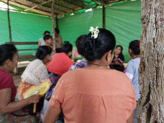 Participants at a group psychosocial care session run by MSF mental health counselors on the grounds of a High School near Mandalay city.
