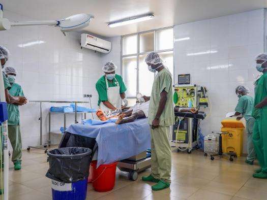 Doctors treat a victim of violence in Bunia, Ituri province, DR Congo