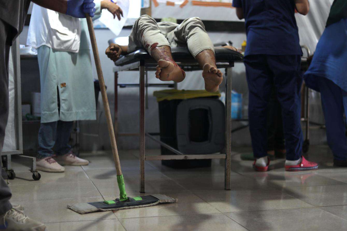 A civilian injured while trying to get food at a GHF distribution site in Gaza.