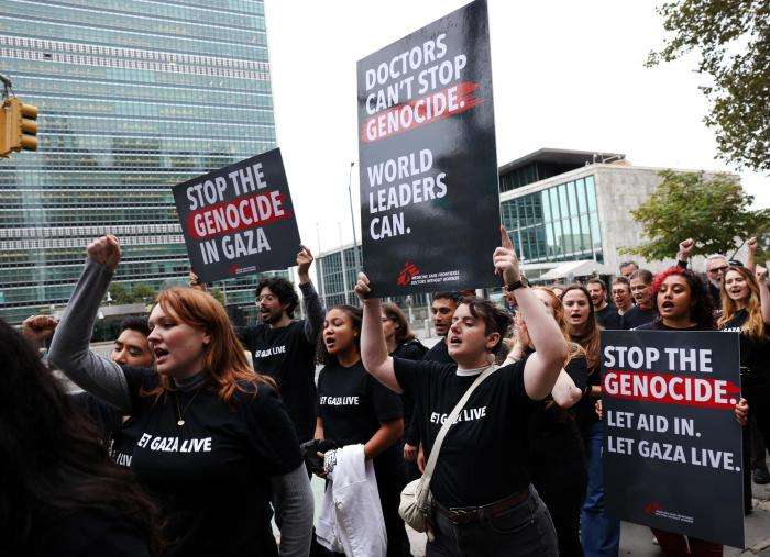 MSF USA staff, medical aid workers, and supporters gather in front of UN headquarters in New York during the September 2025 session of the General Assembly to call on world leaders to take urgent action to stop the genocide in Gaza.