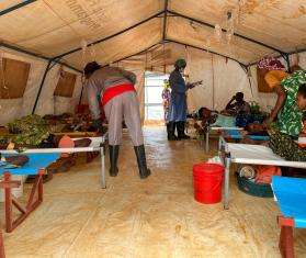 Medical staff treat cholera patients in Burundi. 