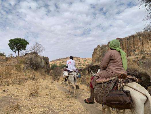 An MSF team on their way to Dilli village to deliver health care supplies in the Jebel Marra Mountains. in Sudan. 