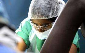 An MSF surgeon performing an operation.