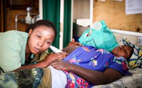 A pregnant woman receives prenatal care from an MSF midwife in preparation of her delivery.
