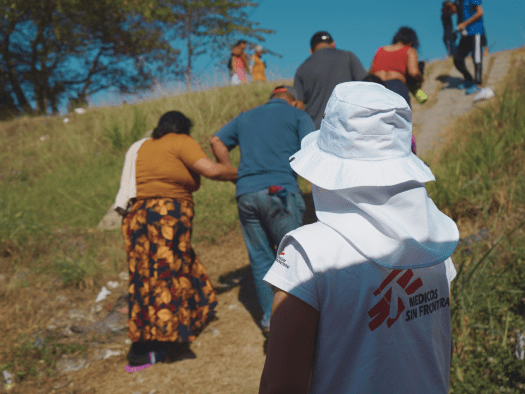 Migrants pass through the town of Huixtla, where MSF carried out a mobile clinic.
