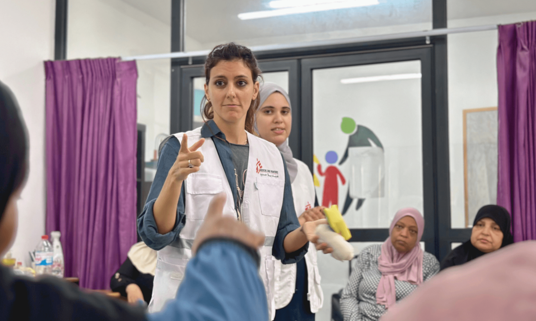 MSF staff train Palestinian women on basic first aid in the West Bank.