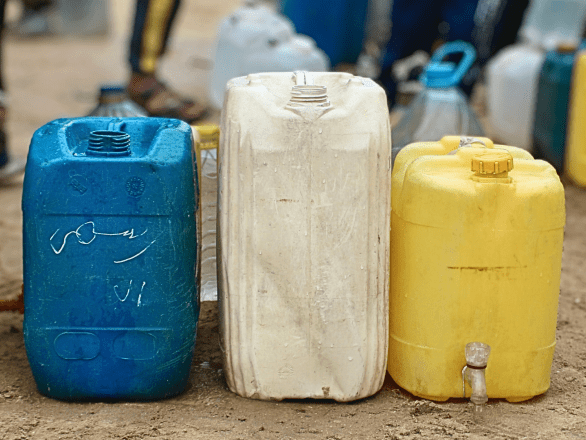 Jerrycans filled with water in Gaza.