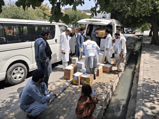 MSF staff distribute supplies in Afghanistan. 